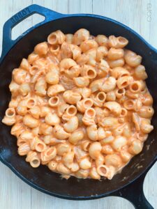 Kimchi Mac & Cheese - Make sure all the noodles are evenly coated in the yummy cheese sauce and spread out evenly