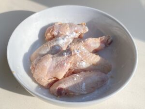 Crispy baked chicken wings - the secret to crispy oven baked chicken wings is a good coating of cornstarch