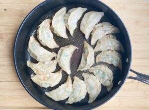 Pork, Shrimp and Chive Dumplings - cooked perfectly with a crispy bottom!